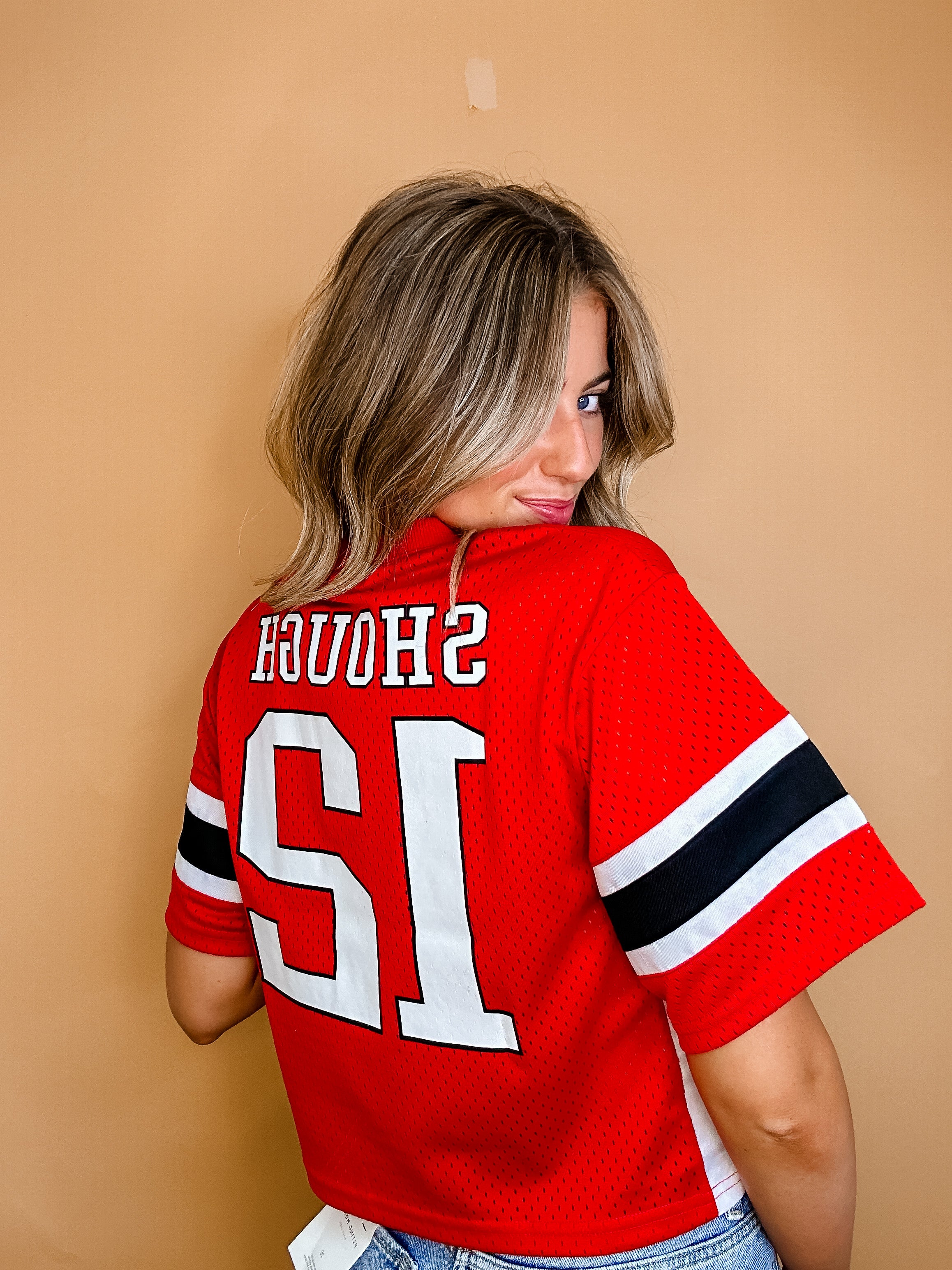 Cropped football jersey on sale tops